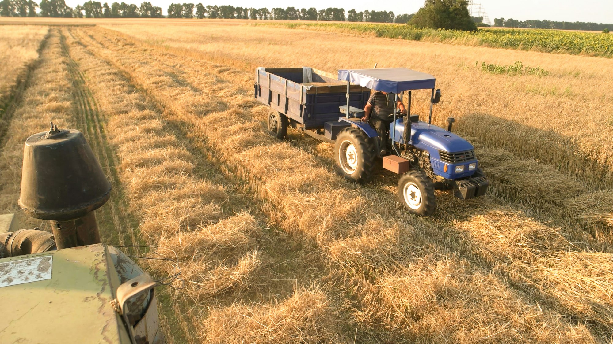 Tractor with trailer.